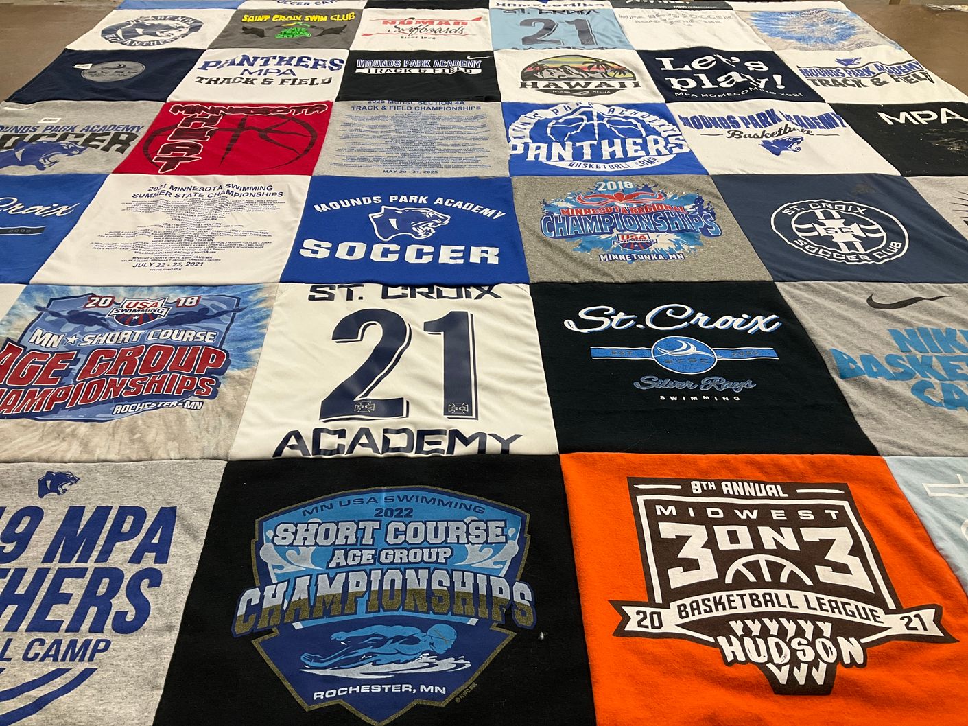 T-shirt quilt featuring st. croix silver rays swimming by Christine from MN