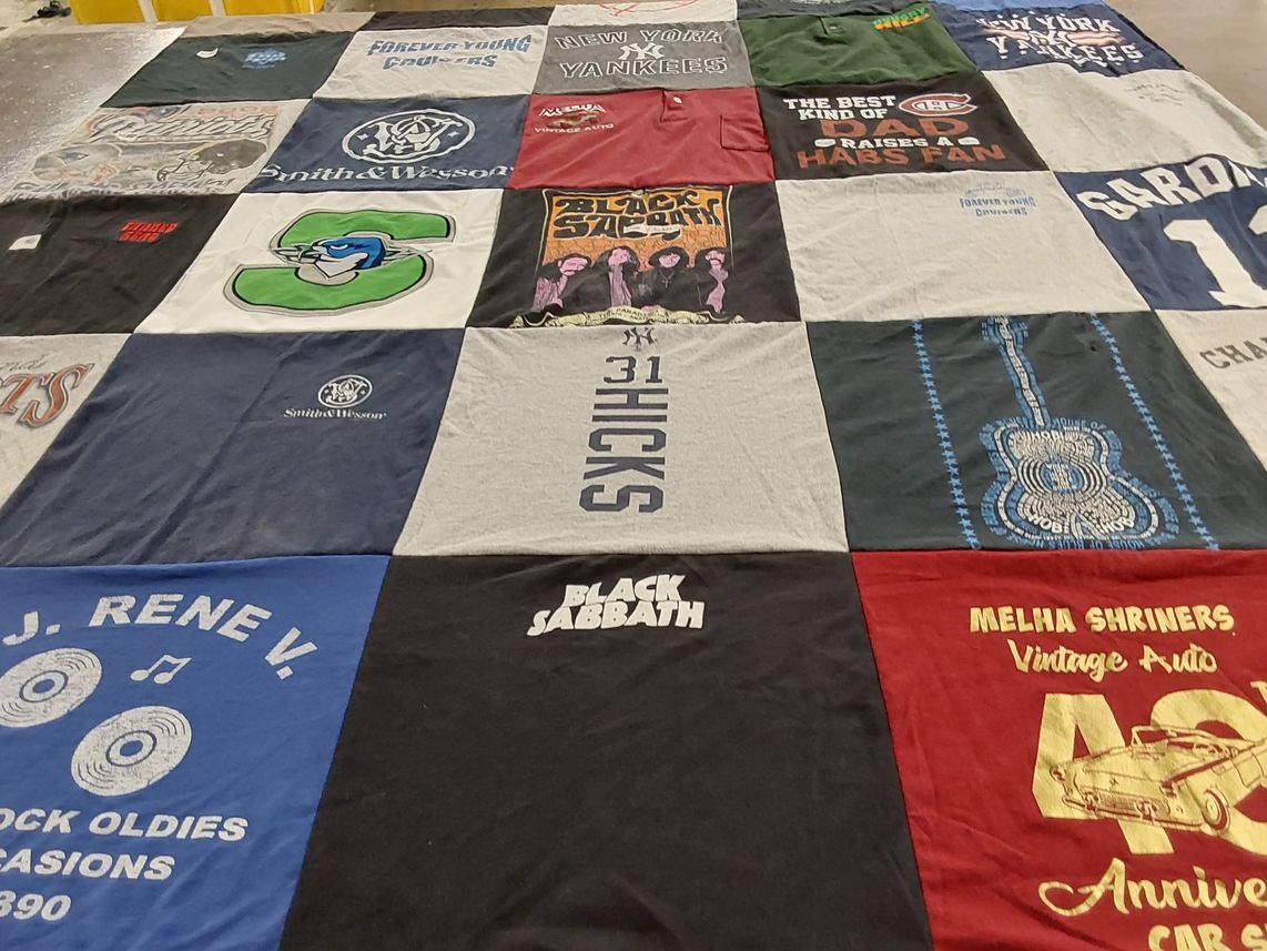 T-shirt quilt with music, sports themes by Diana from MA