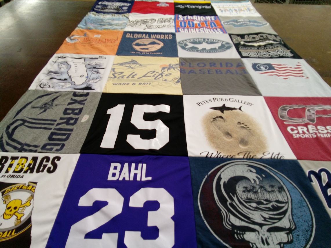 T-shirt quilt with fishing, baseball themes by Amy from FL