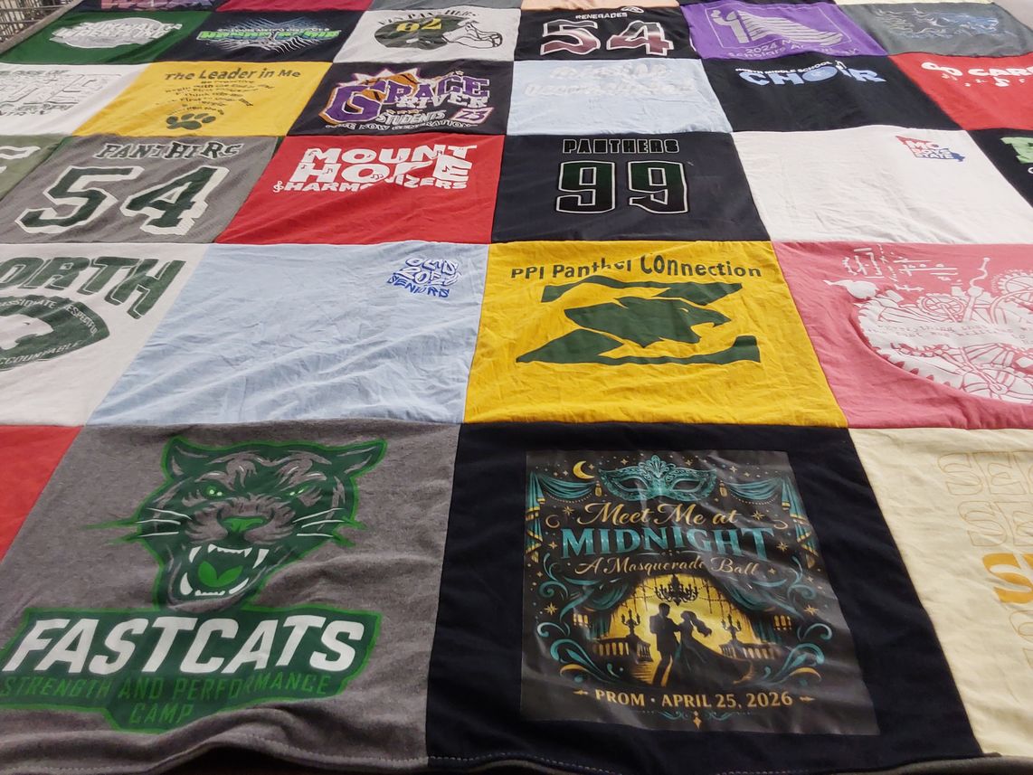 T-shirt quilt featuring pihs panthers, fastcats by Betsy from MO