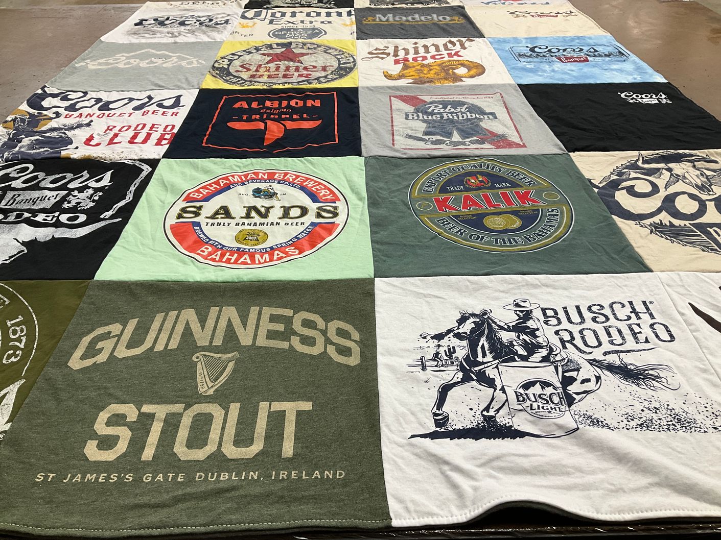 T-shirt quilt with beer, rodeo themes by Brent from UT