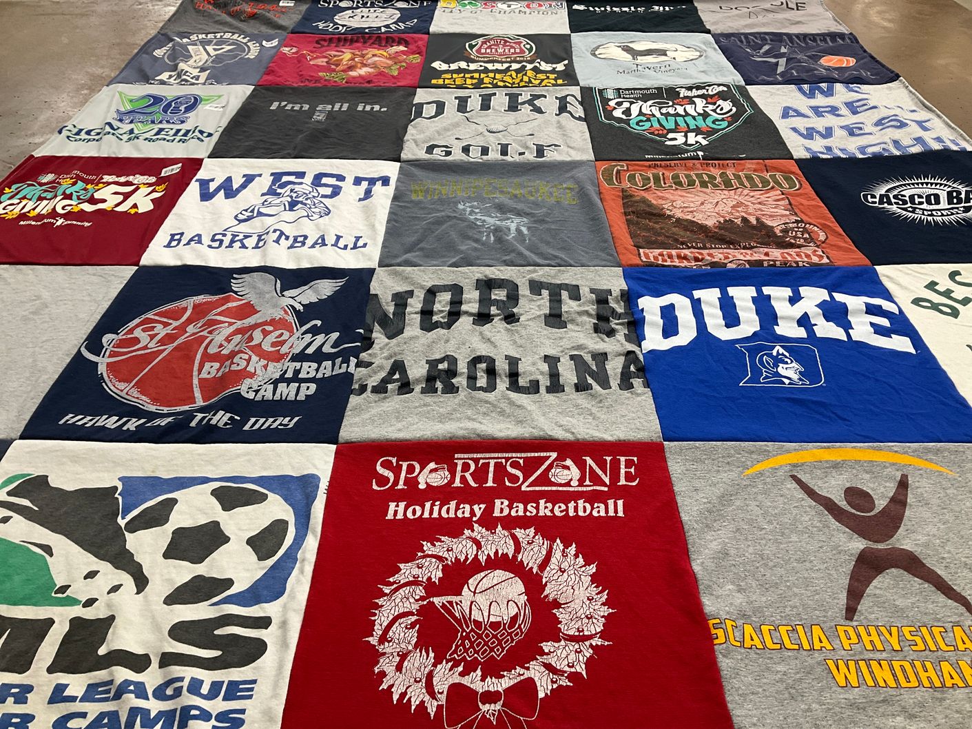 T-shirt quilt featuring duke university basketball, university of north carolina basketball by Amy from NH