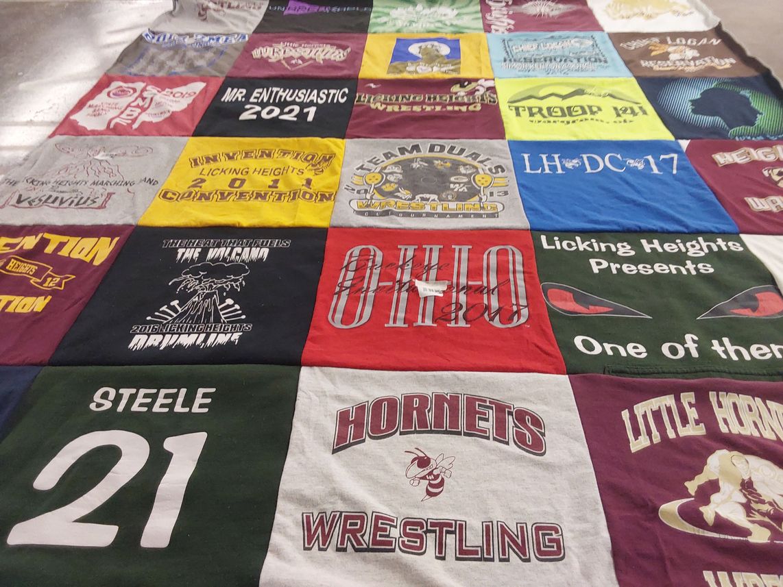 T-shirt quilt featuring licking heights hornets wrestling by Leslie from OH