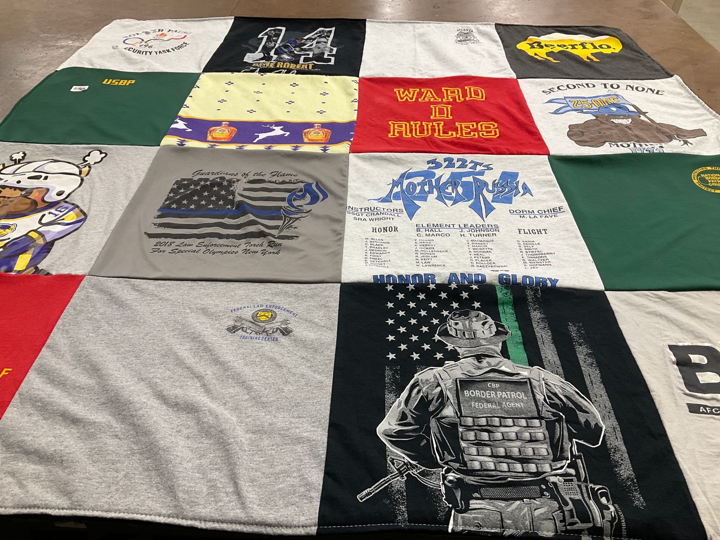 T-shirt quilt with law enforcement, military themes by Katherine from NY