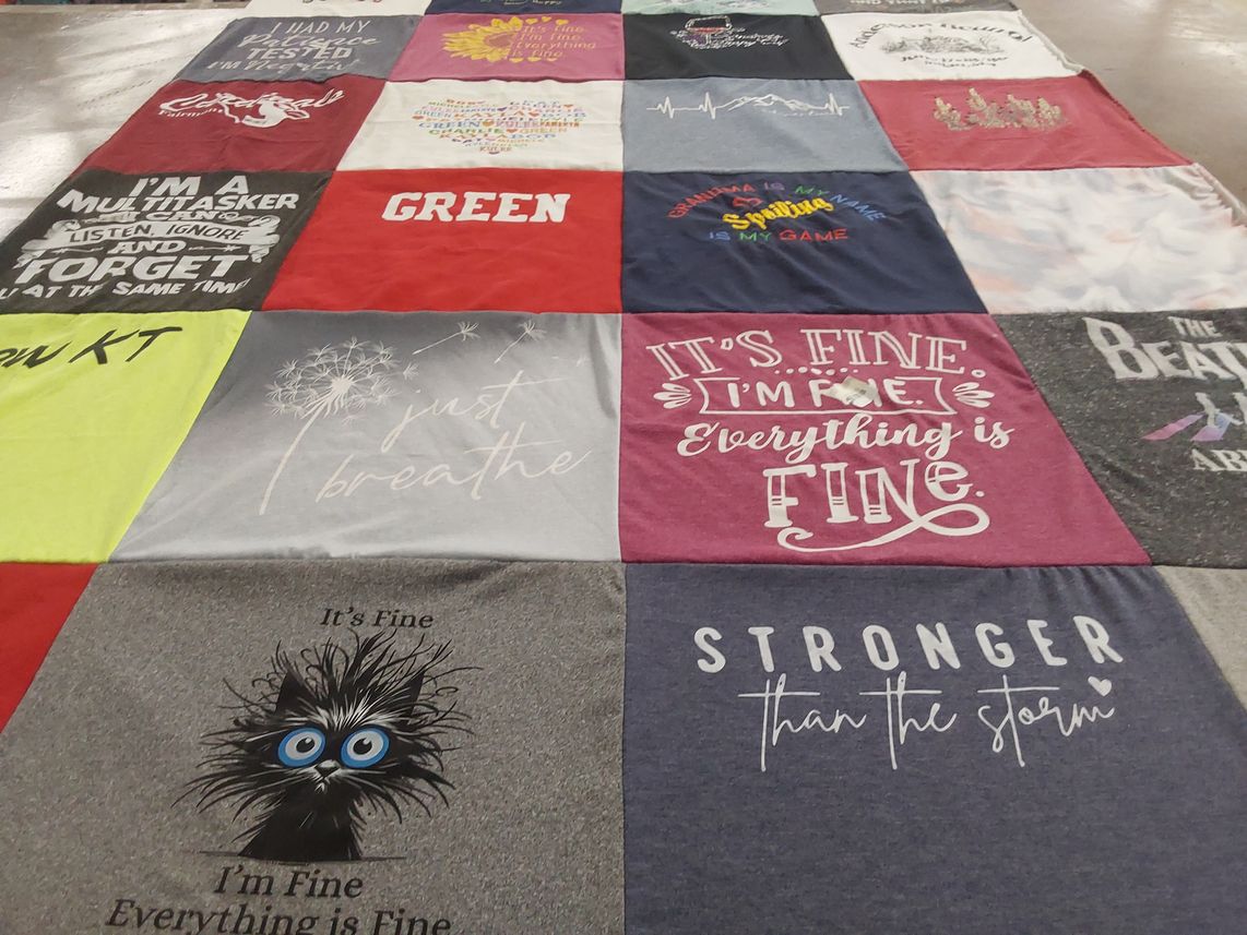 T-shirt quilt with mindfulness, family themes by Michaela from MN