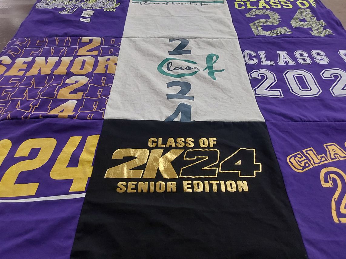 T-shirt quilt with graduation, senior year themes by Janet from TX
