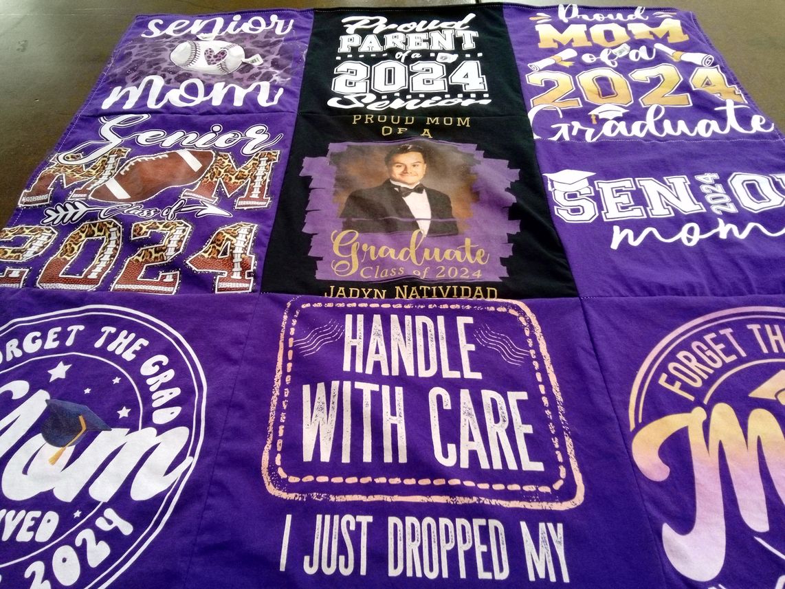 T-shirt quilt with graduation, family themes by Janet from TX