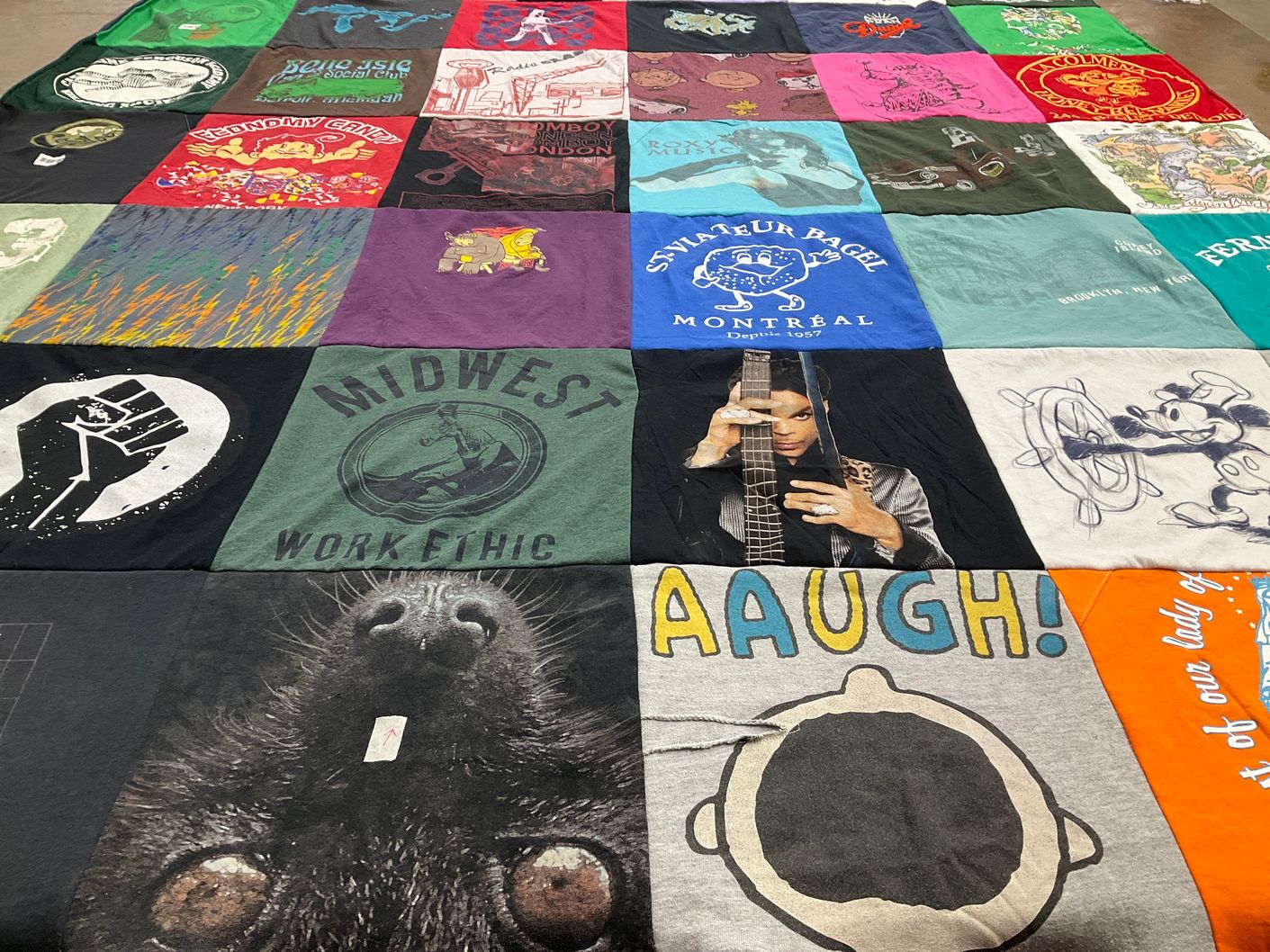 T-shirt quilt with music, art themes by Eileen from NY