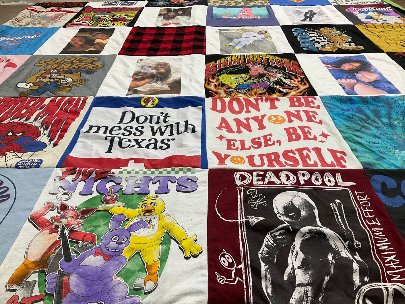 T-shirt quilt with video games, comics themes by Karnisia from AL