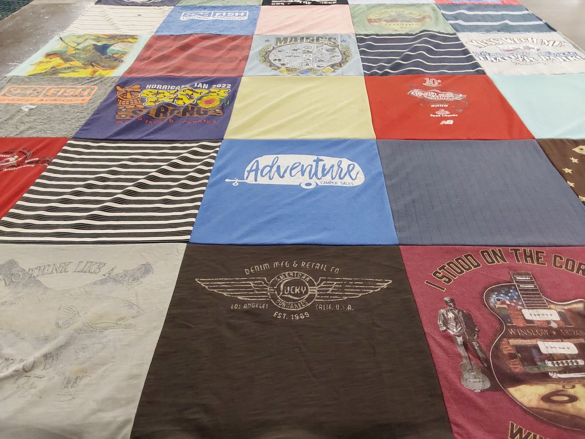T-shirt quilt with fishing, camping themes by Debra from FL
