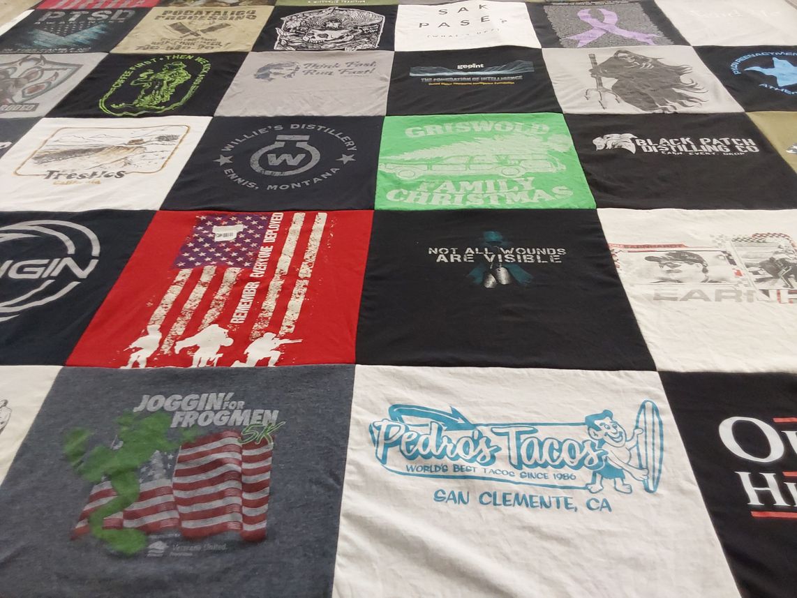 T-shirt quilt with tacos, running themes by Leigh from GA