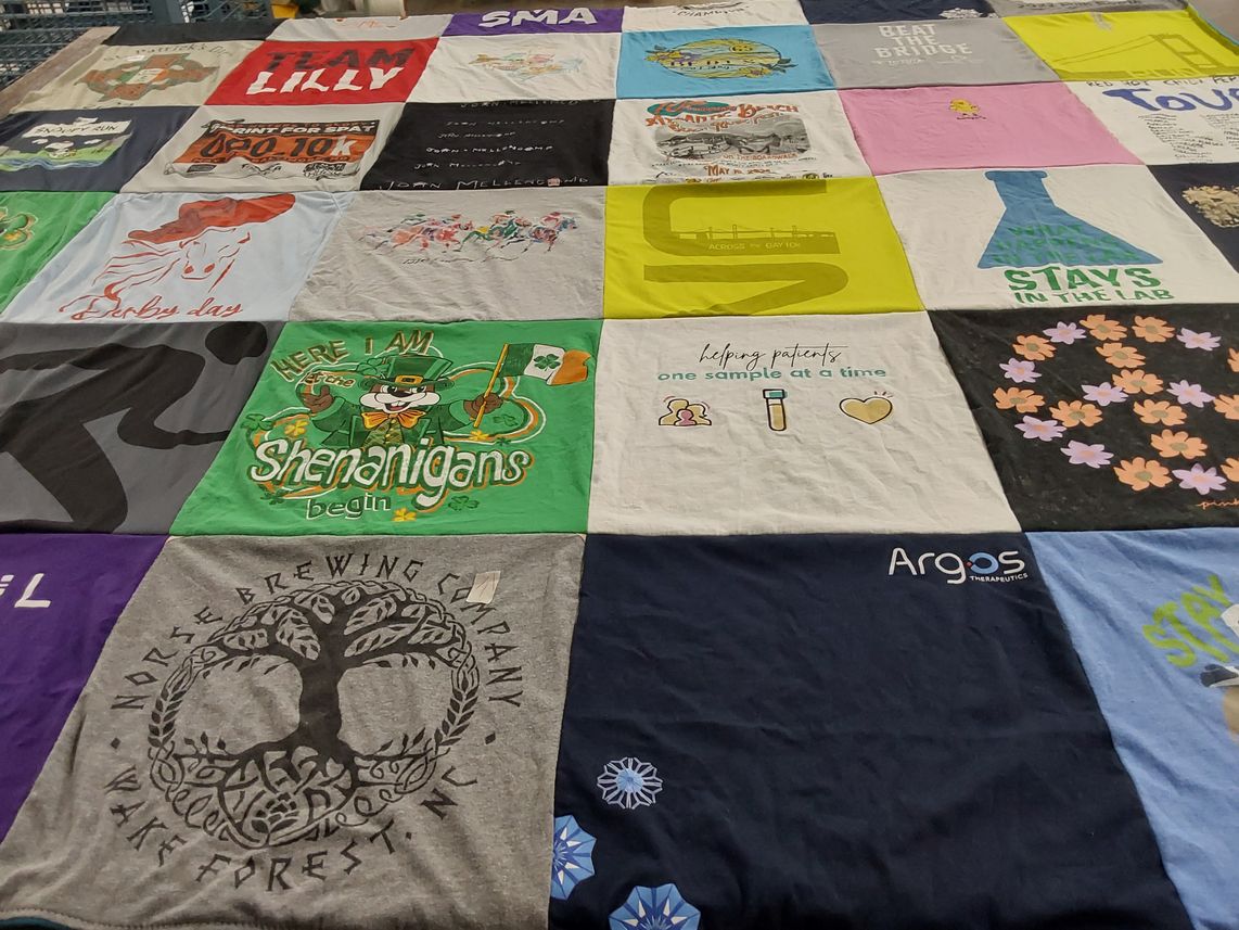 T-shirt quilt with brewing, healthcare themes by Ginger from NC
