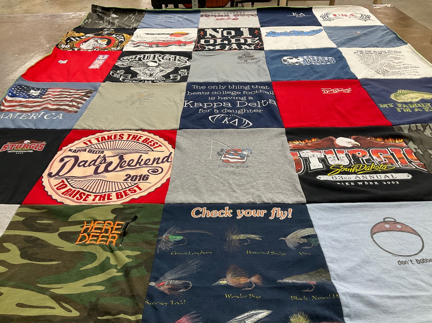 T-shirt quilt with motorcycling, fishing themes by Jennifer from MO