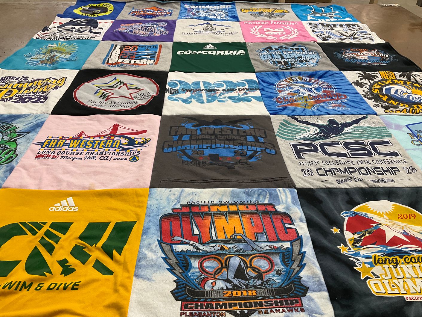 T-shirt quilt featuring junior olympic swim team by Tricia from CA