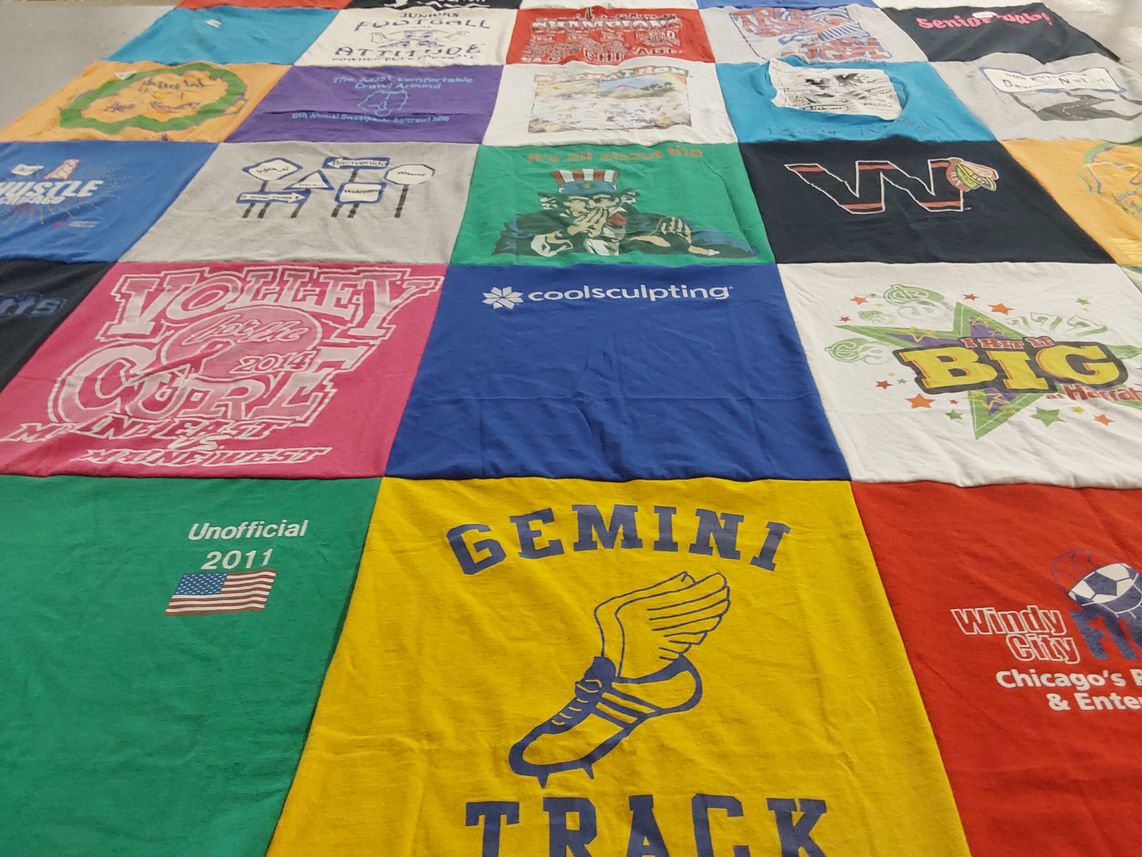 T-shirt quilt with sports, athletics themes by Amalia from IL