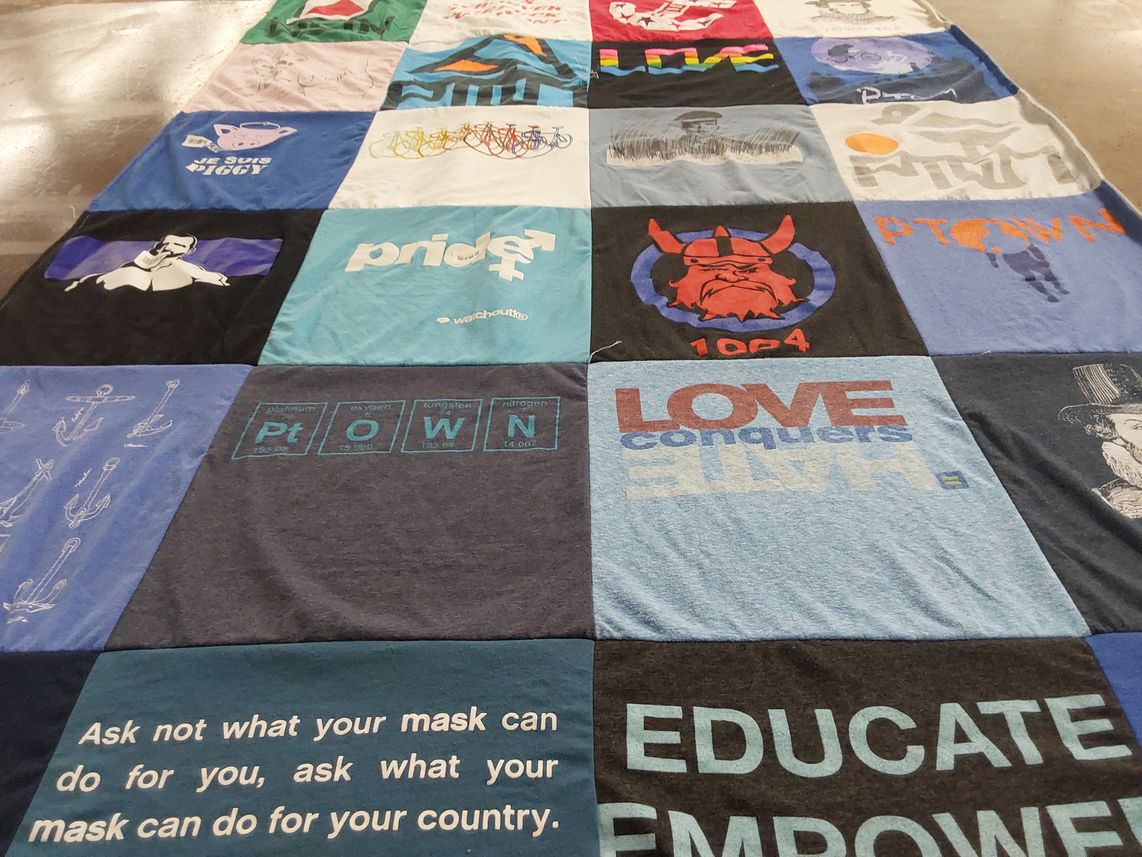 T-shirt quilt with education, activism themes by Leif from MA