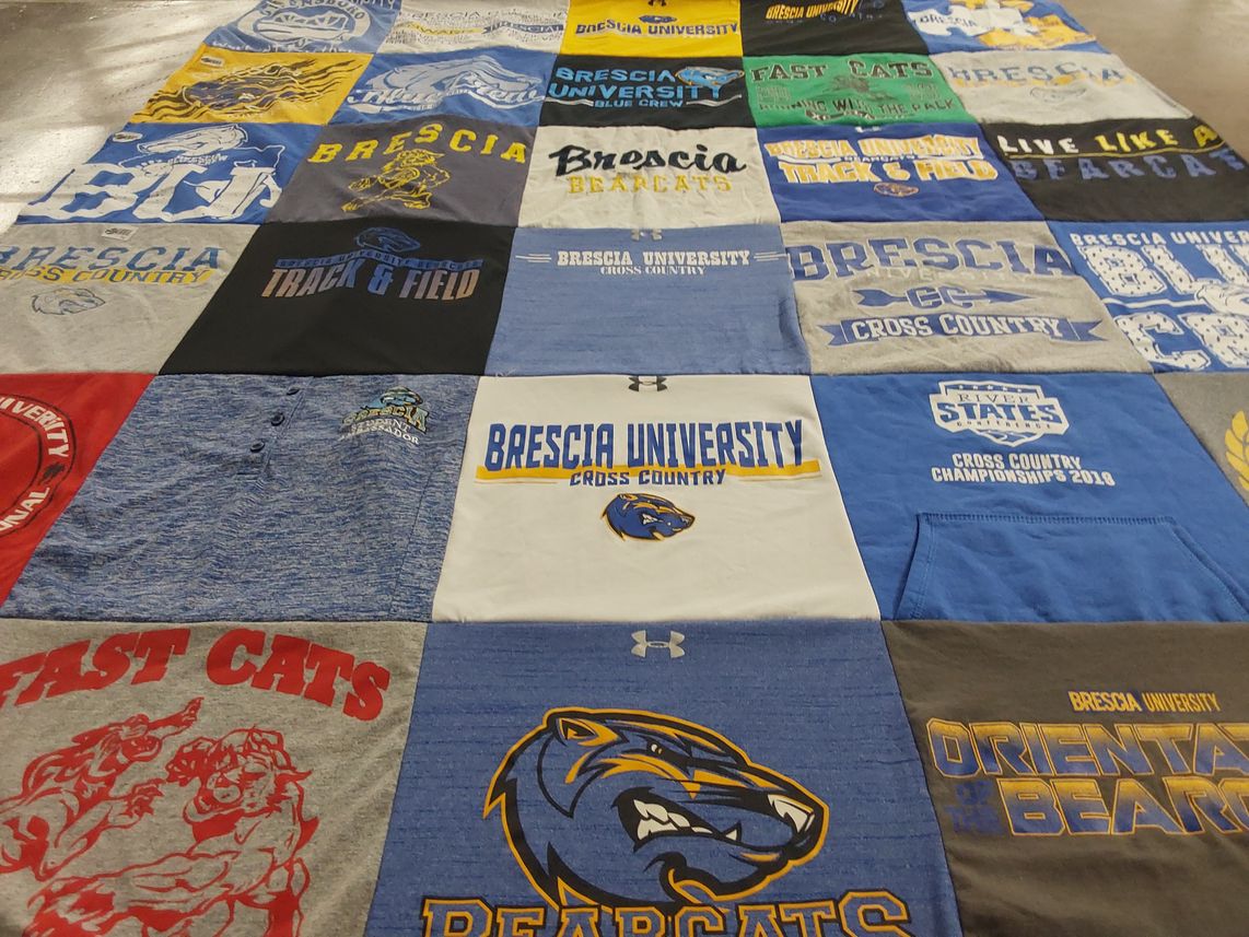 T-shirt quilt featuring brescia university cross country, bearcats by Madeline from IL