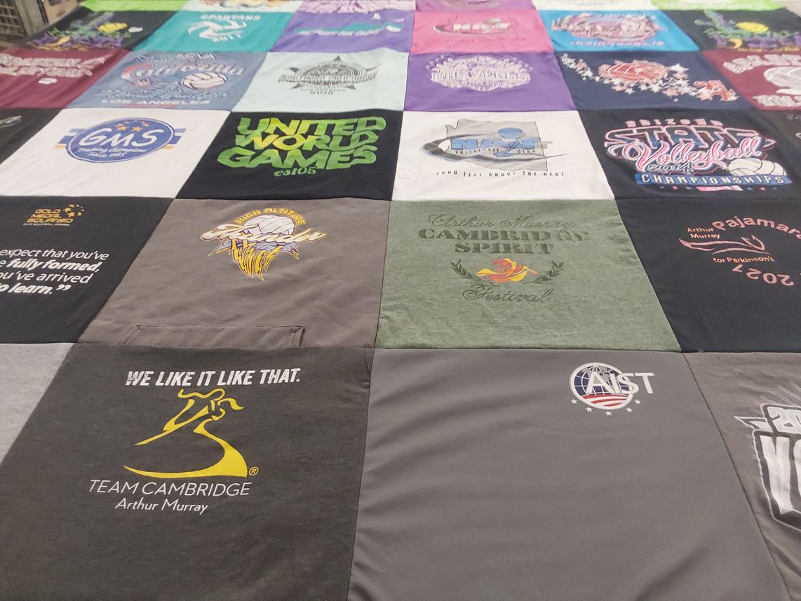 T-shirt quilt with sports, volleyball themes by Mac from AZ