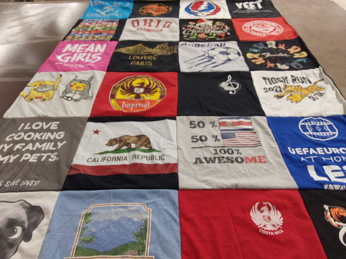 T-shirt quilt with cooking, pets themes by Stephanie from CA