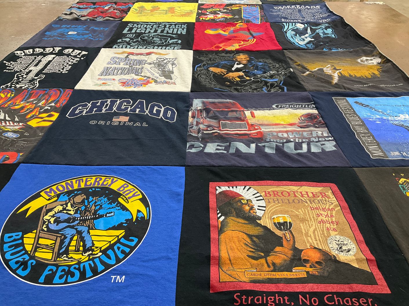 T-shirt quilt with blues, music themes by Alia from CA