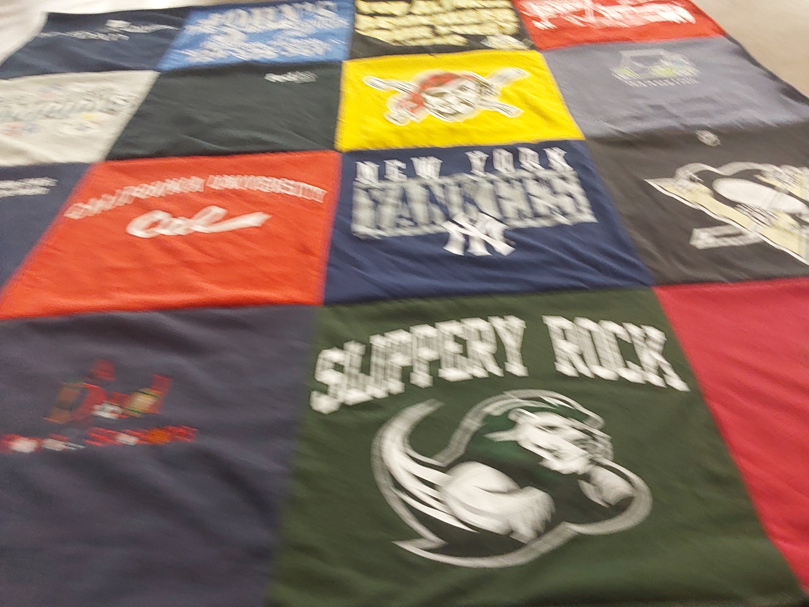 T-shirt quilt featuring pittsburgh penguins, west virginia mountaineers by Rita from PA