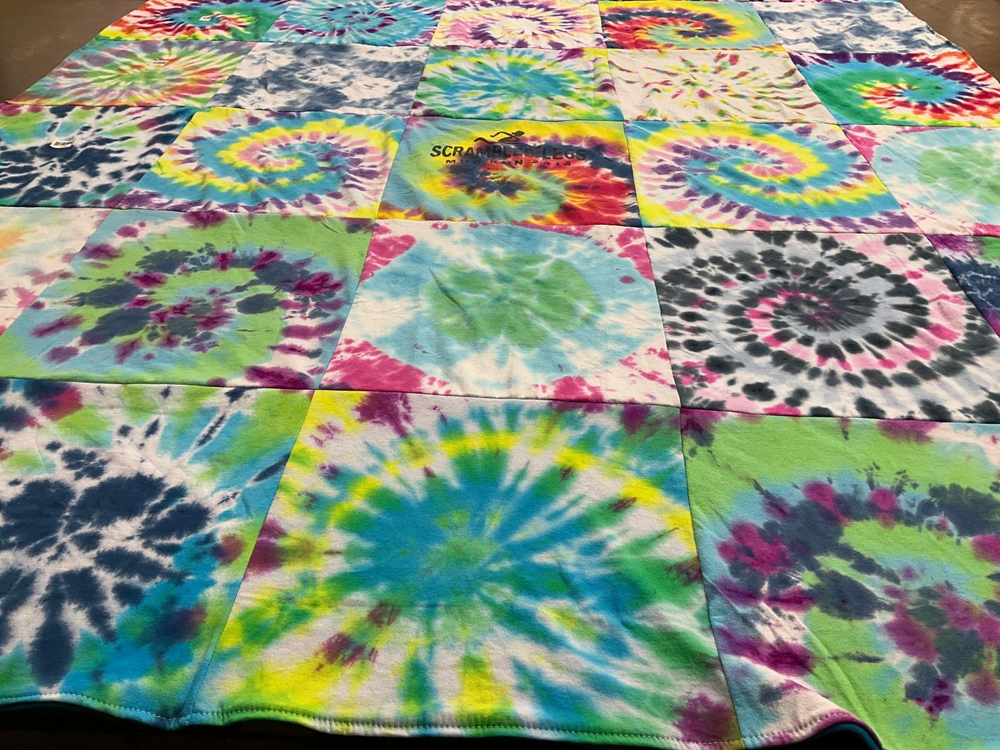 T-shirt quilt with tie dye, colorful patterns themes by Ingrid from WI
