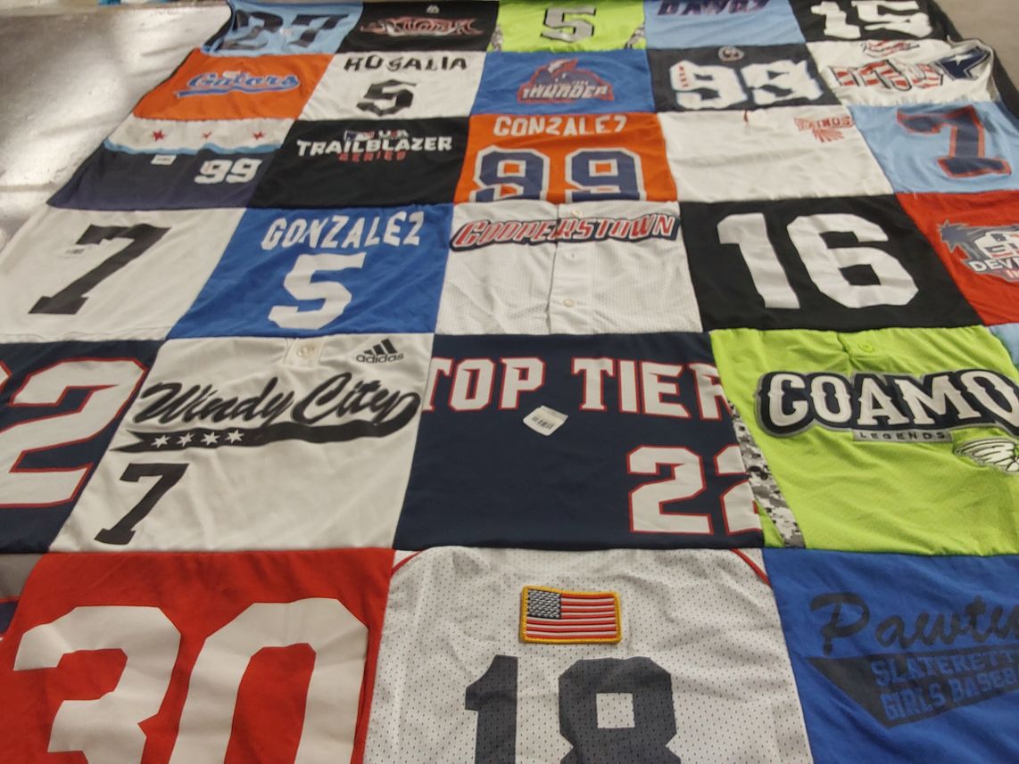 T-shirt quilt with sports themes by Geovanna from IL