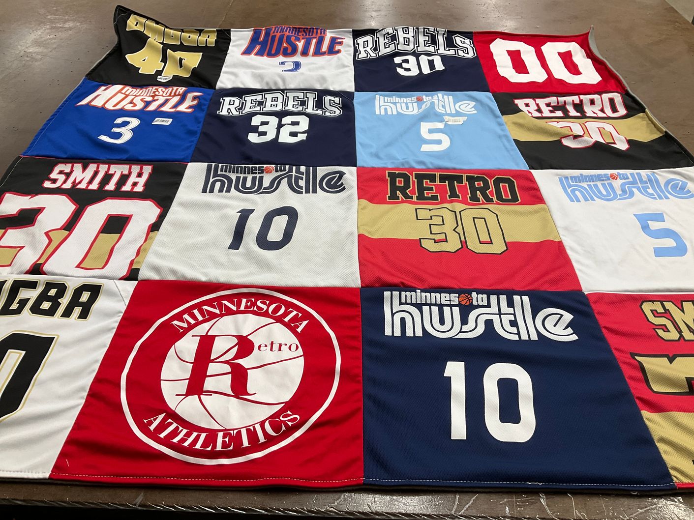 T-shirt quilt featuring minnesota hustle by Megan from MN