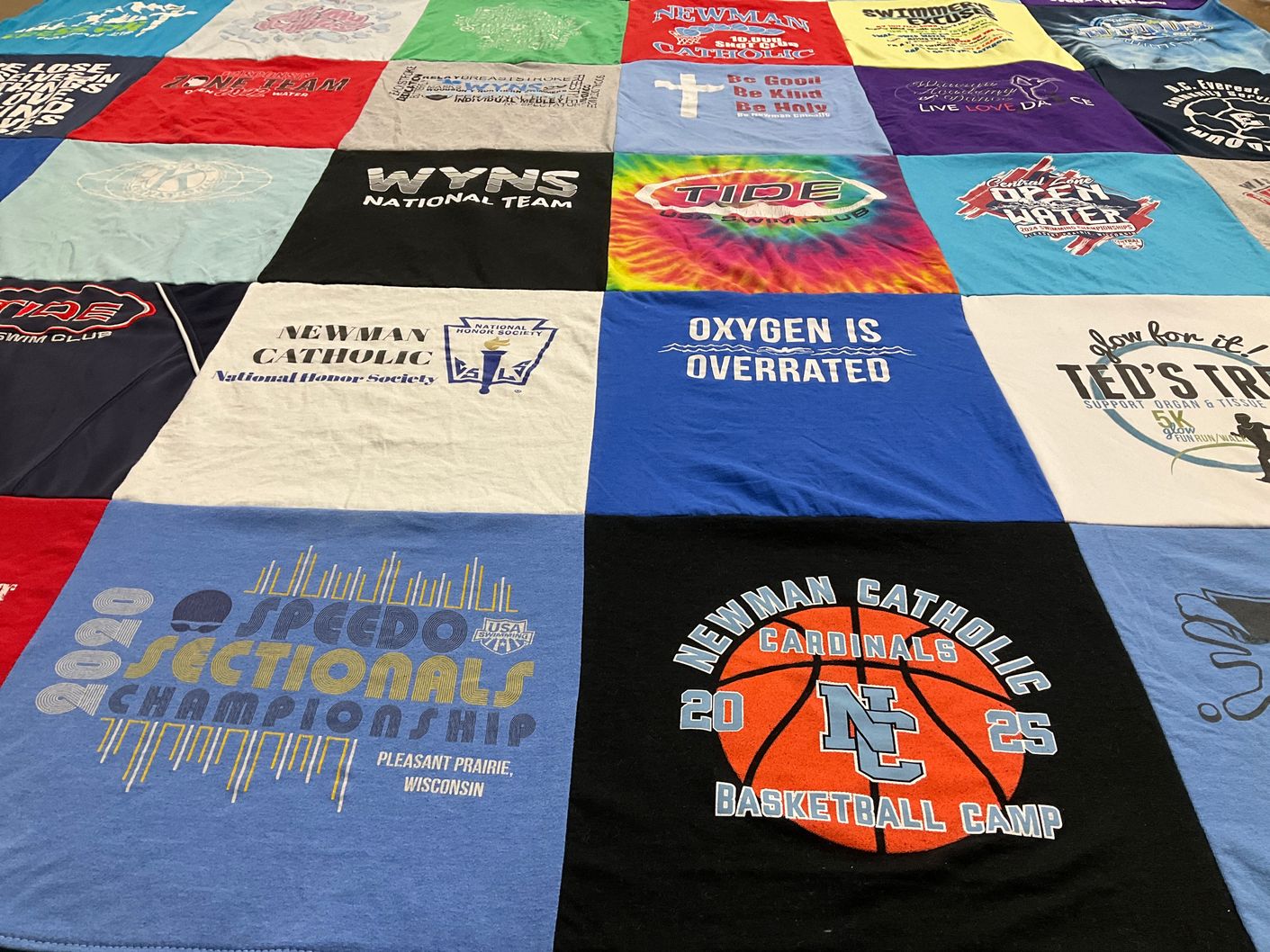 T-shirt quilt featuring newman catholic cardinals basketball team by Shana from WI