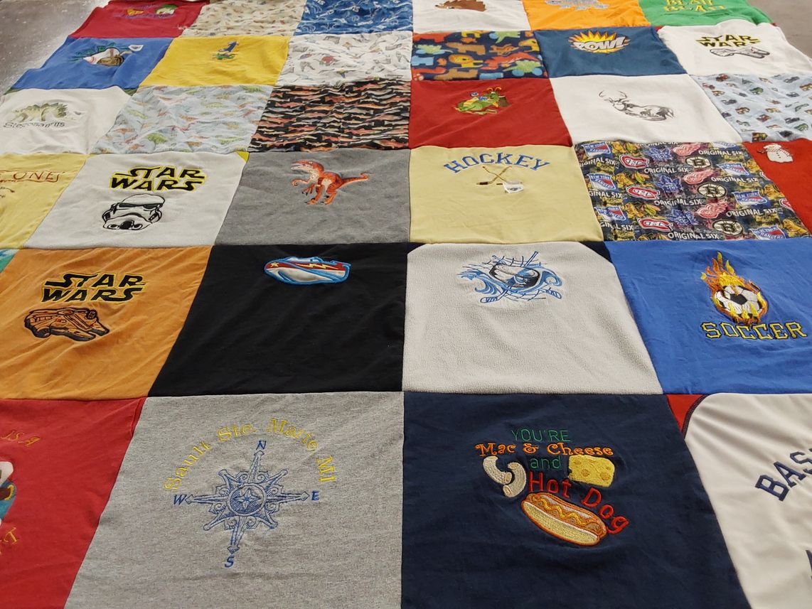 T-shirt quilt with sports, movies themes by Colleen from MI