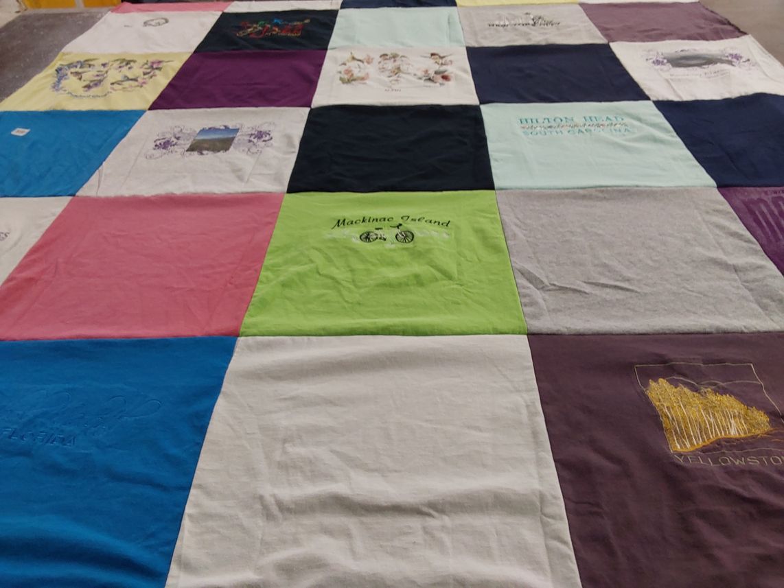 T-shirt quilt with travel, nature themes by Charlotte from IL