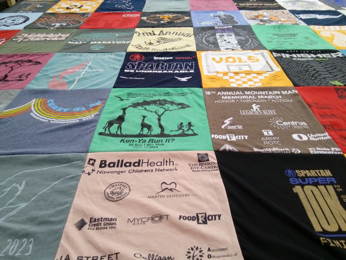 T-shirt quilt featuring volunteers by Hunter from VA