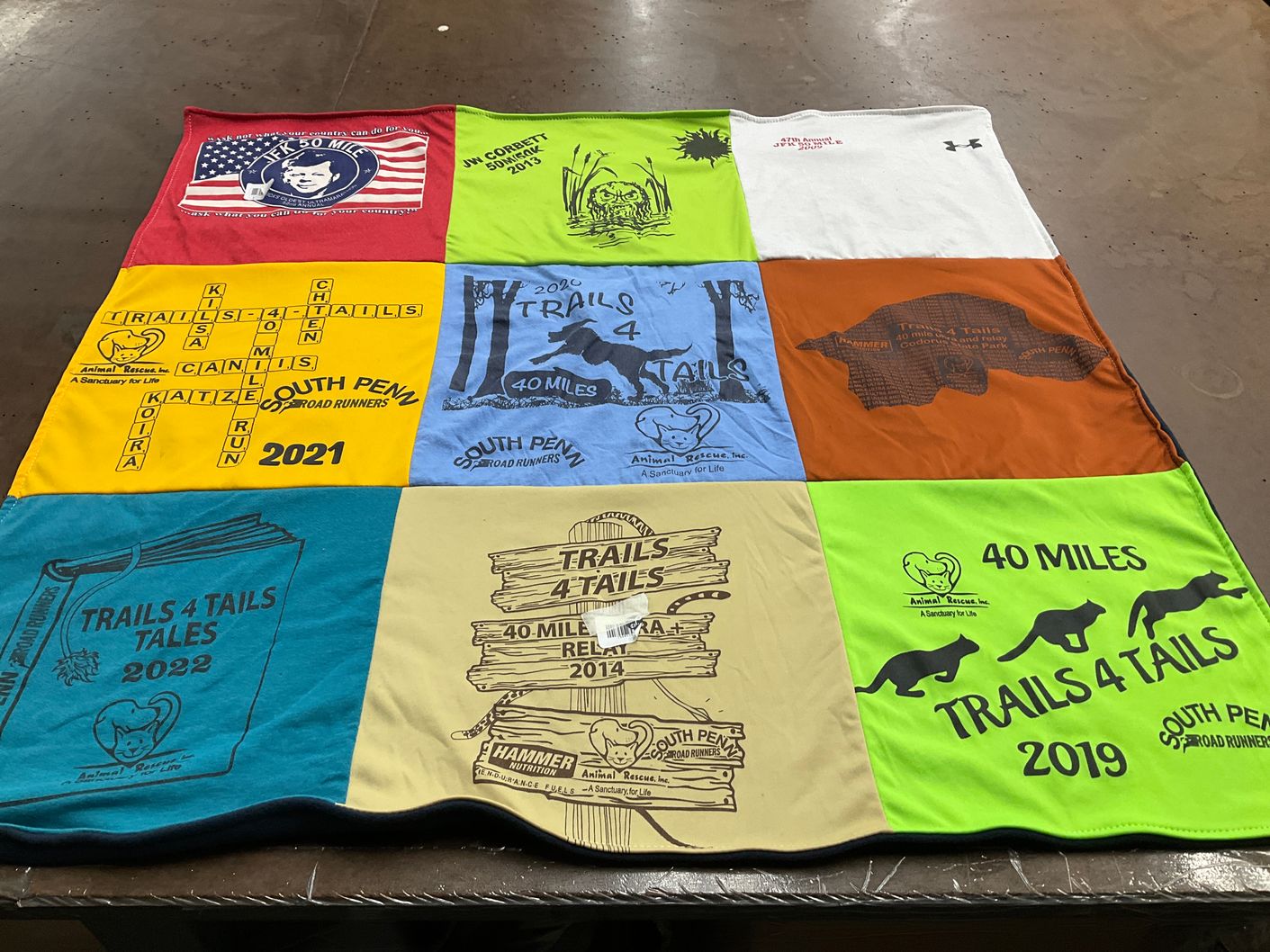 T-shirt quilt with animal rescue, running themes by Michael from PA