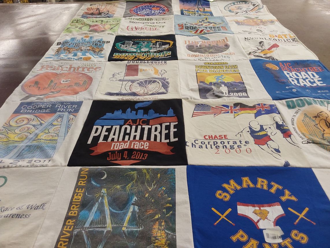 T-shirt quilt with running, fitness themes by Laura from GA