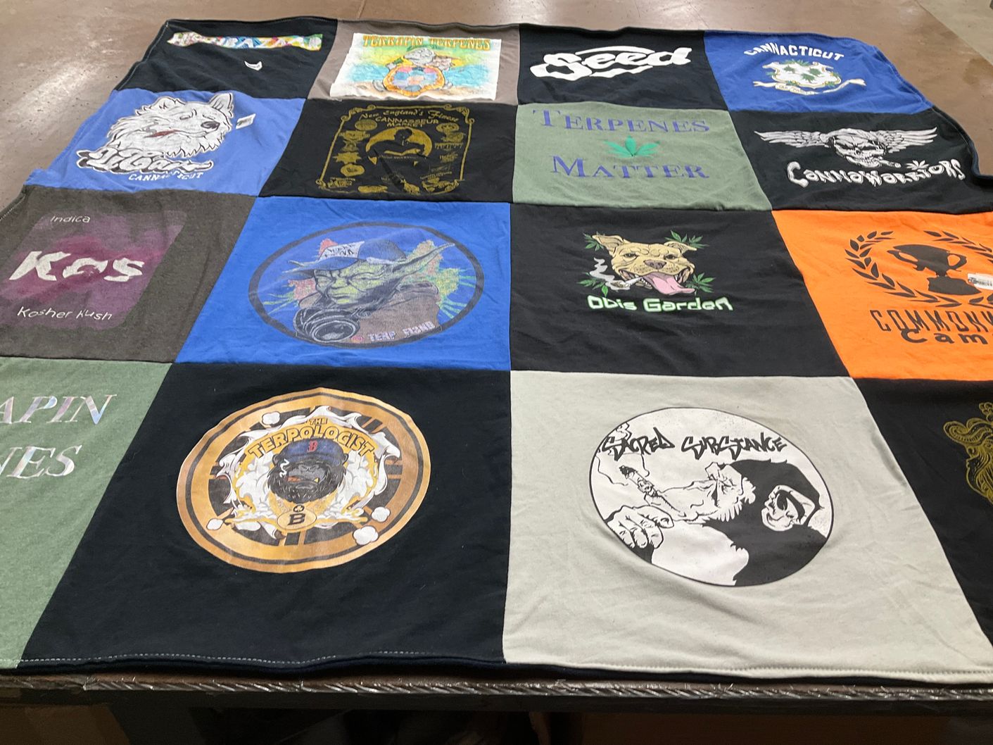 T-shirt quilt with cannabis, gardening themes by Emily from MA