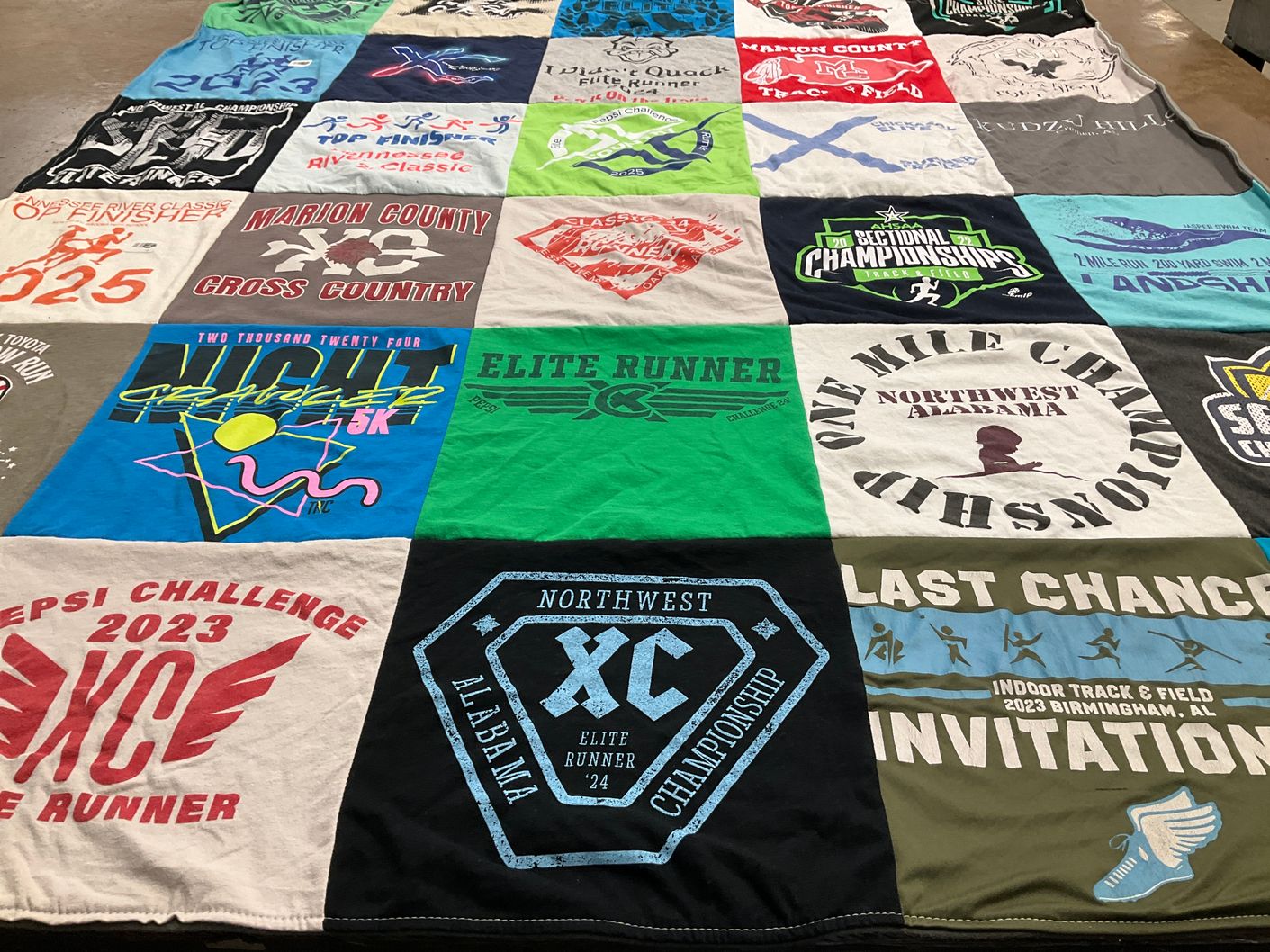 T-shirt quilt featuring northwest alabama cross country, elite runner team by Amanda from AL