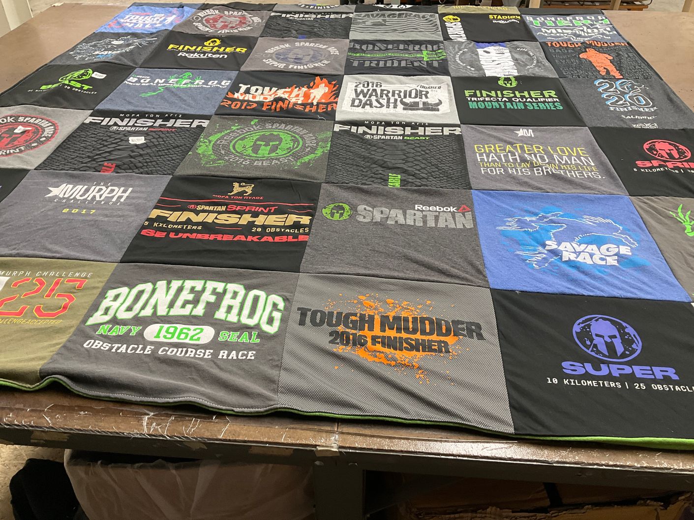 T-shirt quilt with obstacle courses, races themes by Patrick from TX