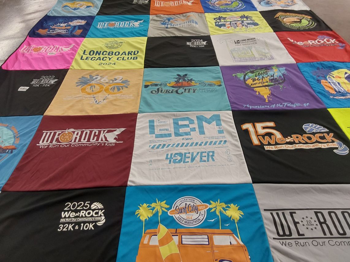 T-shirt quilt with community service, running themes by Juintow from CA