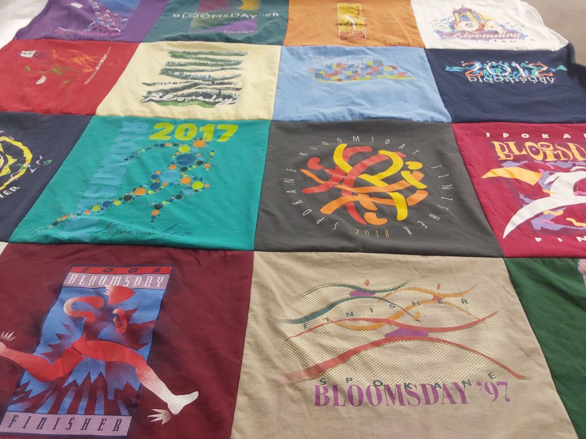 T-shirt quilt with running, fitness themes by Linda from ID