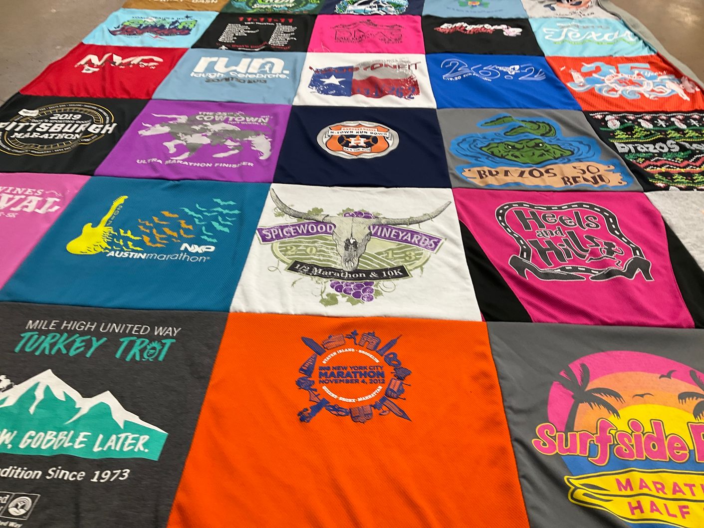 T-shirt quilt with marathons, races themes by Kamini from TX