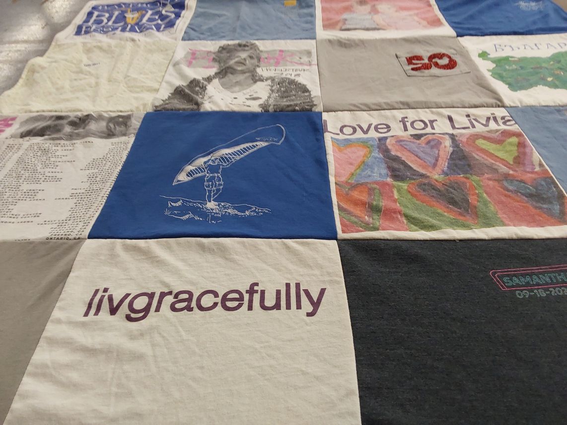 T-shirt quilt with art, music themes by Jodi from IL