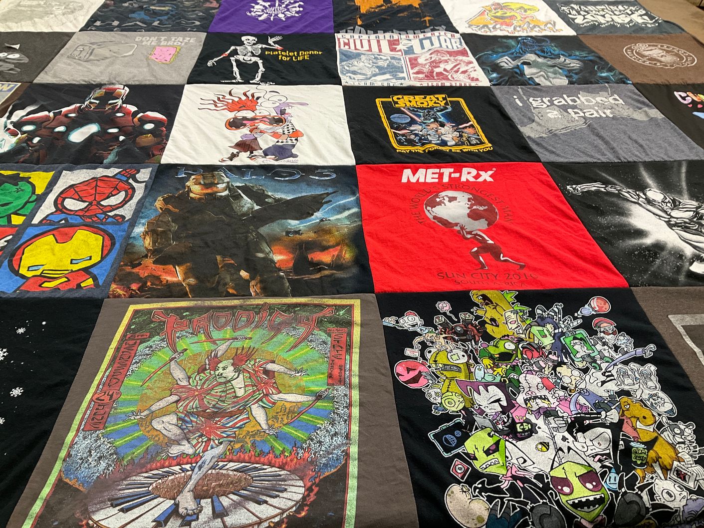 T-shirt quilt with gaming, comics themes by Carrie from OH