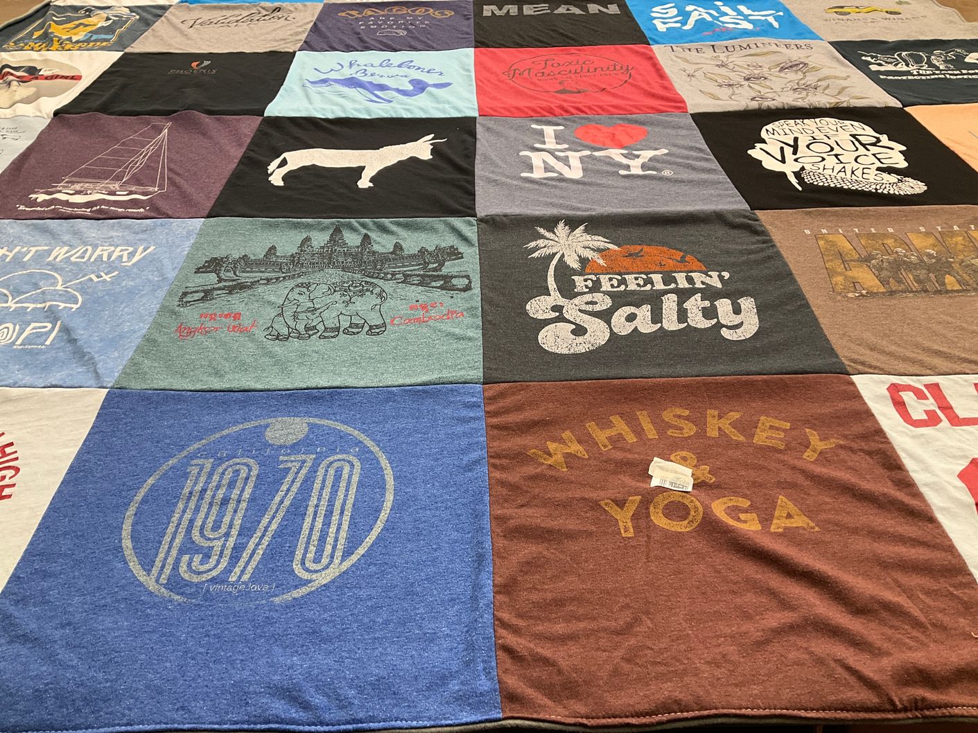 T-shirt quilt with travel, music themes by Krista from WA