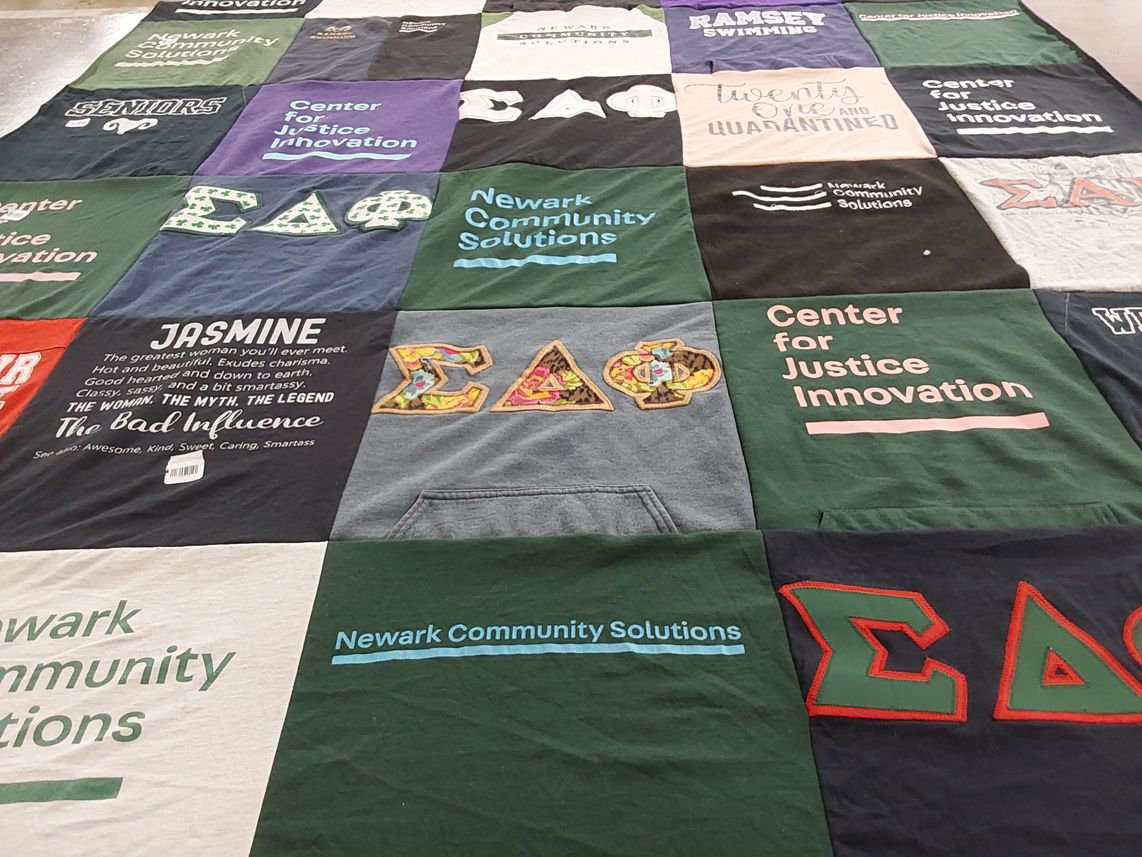 T-shirt quilt with community service, empowerment themes by Jasmine from NJ