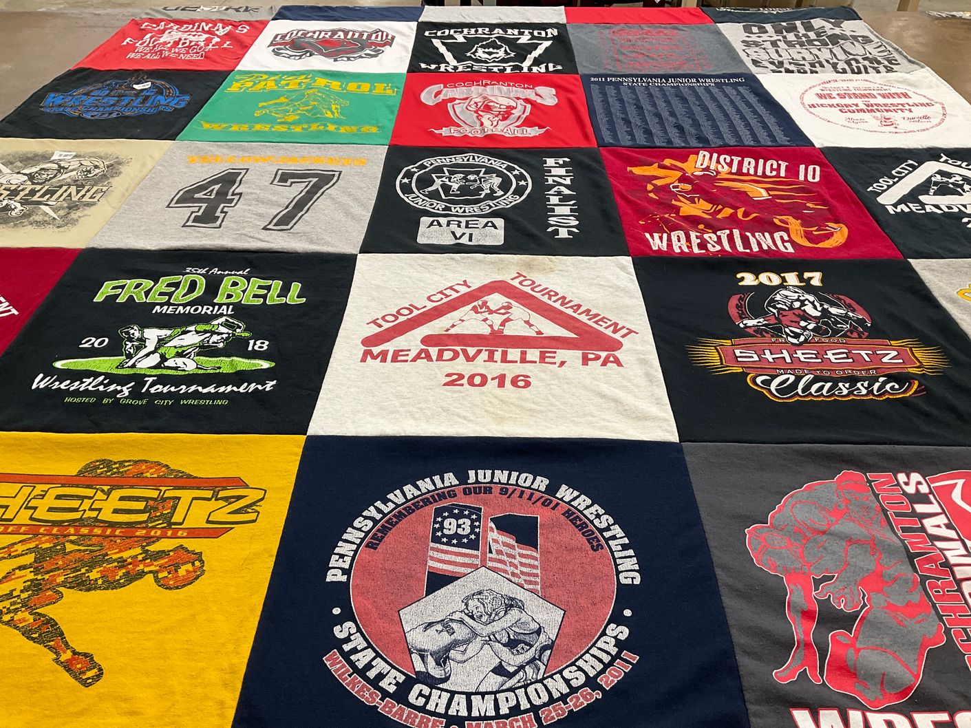 T-shirt quilt with wrestling themes by Stacey from PA
