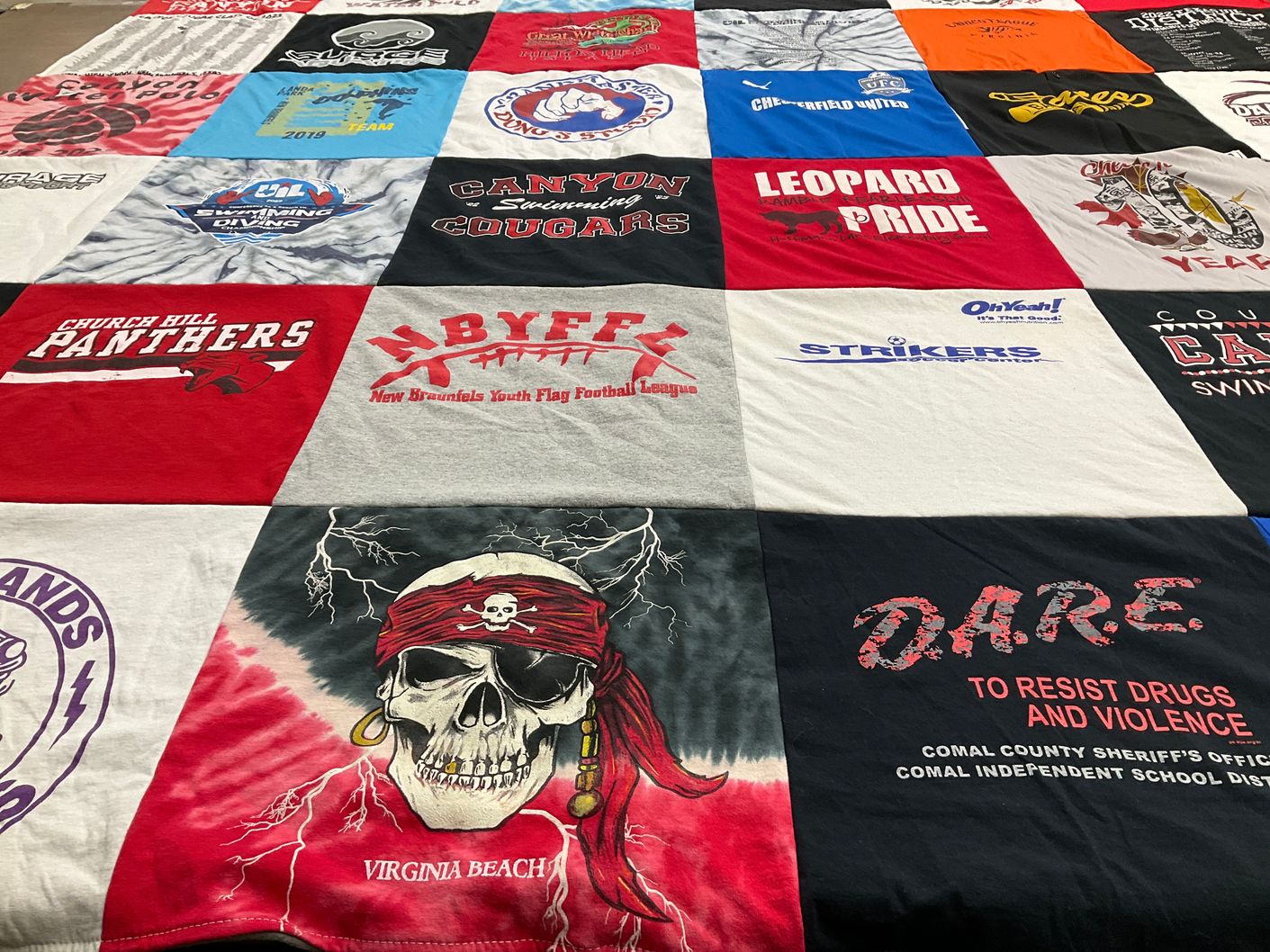 T-shirt quilt featuring canyon cougars, church hill panthers by Heather from TX