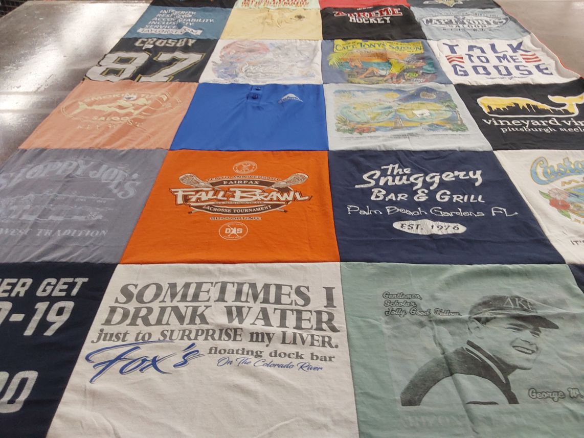 T-shirt quilt with hockey, bar and grill themes by Catherine from FL