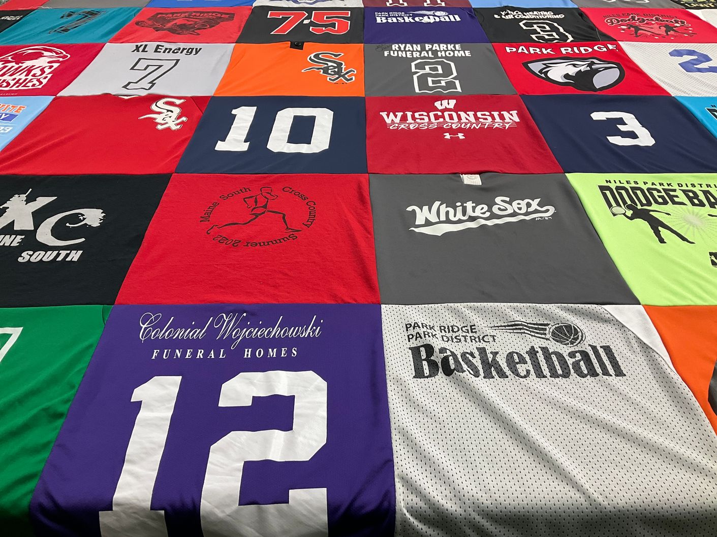 T-shirt quilt featuring wisconsin cross country team, white sox by Sara from IL