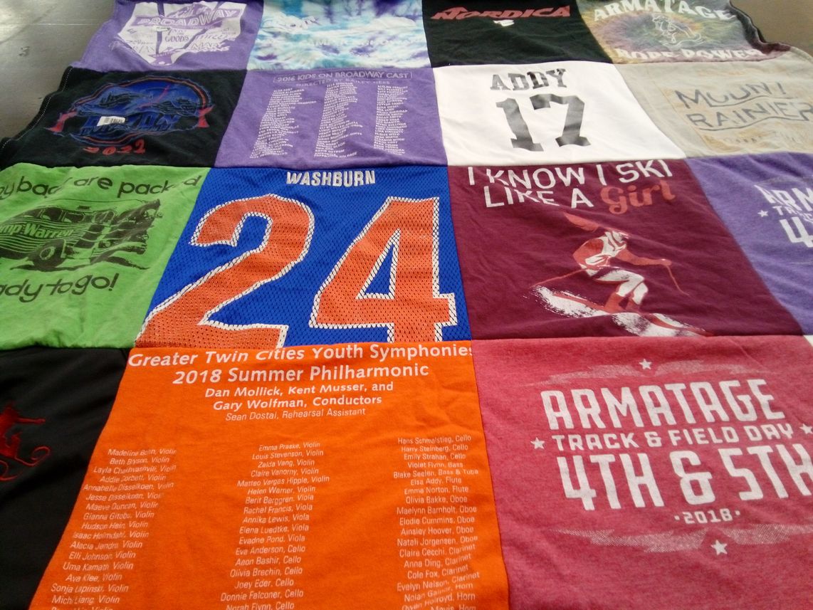 T-shirt quilt featuring armitage track and field by Amy from MN