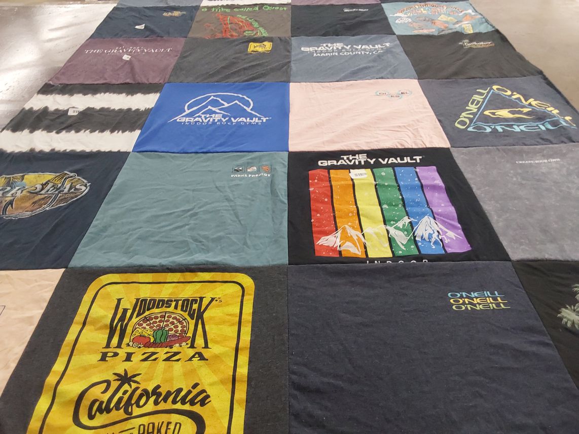 T-shirt quilt with climbing, outdoor activities themes by Brian from CA